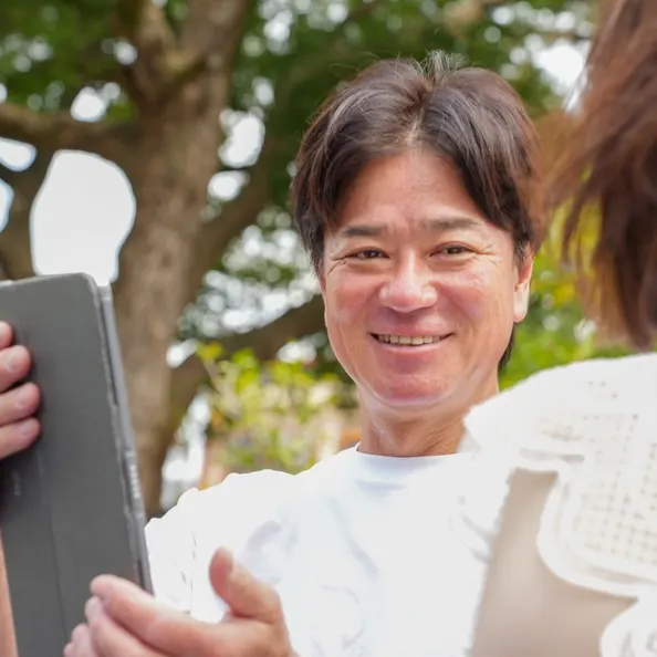 査定内容を説明するGPSのスタッフ